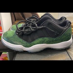 Low top green snakeskin Jordan 11s